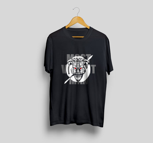 Black t-shirt with graphic design on a hanger against a gray background